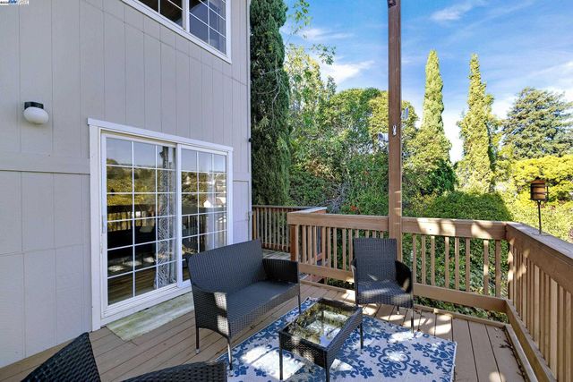 a view of a chair in wooden deck