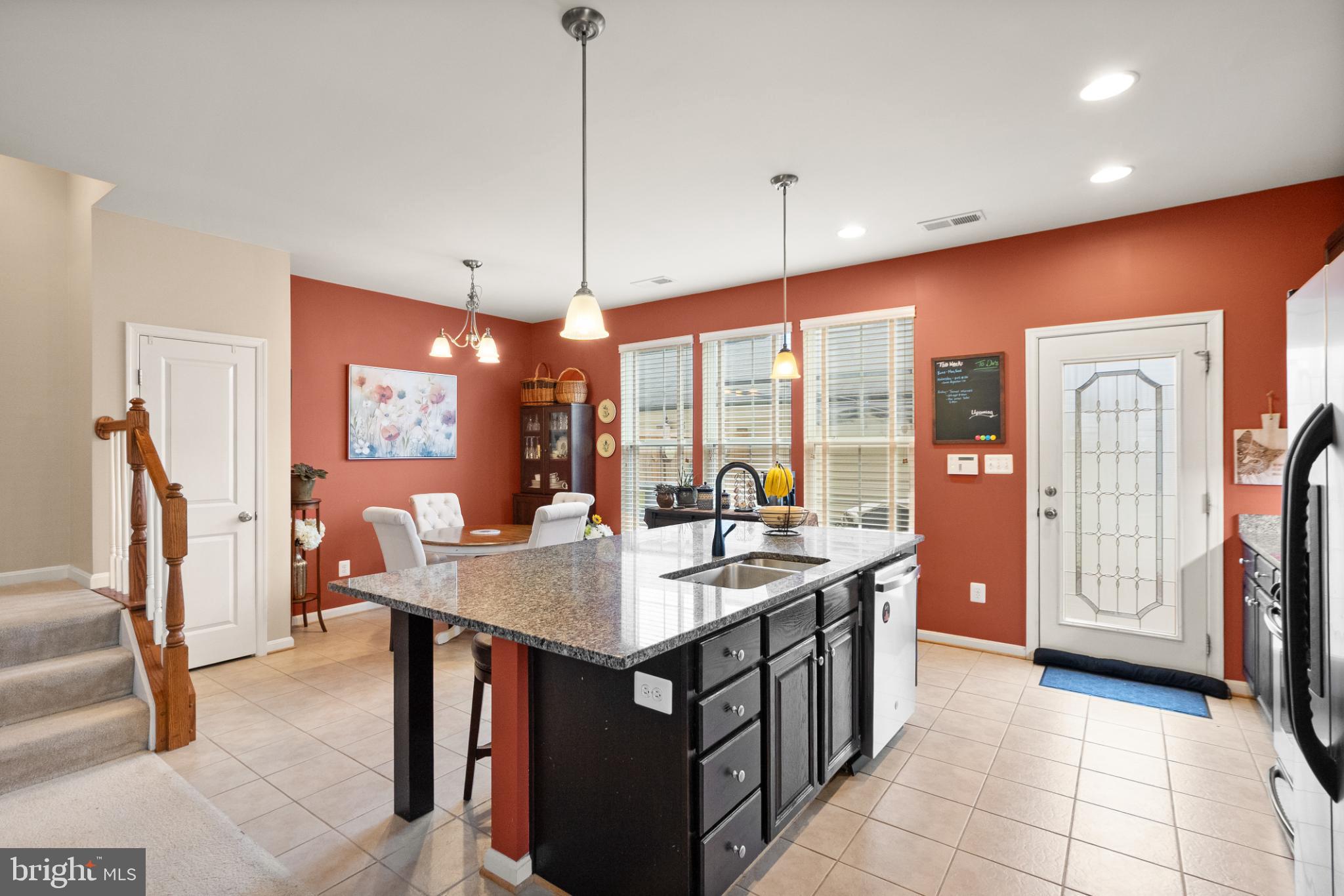11968 Benton Lake Road Bristow, VA 20136 - Photo 16 of 52 More cabinet space under the granite prep island!