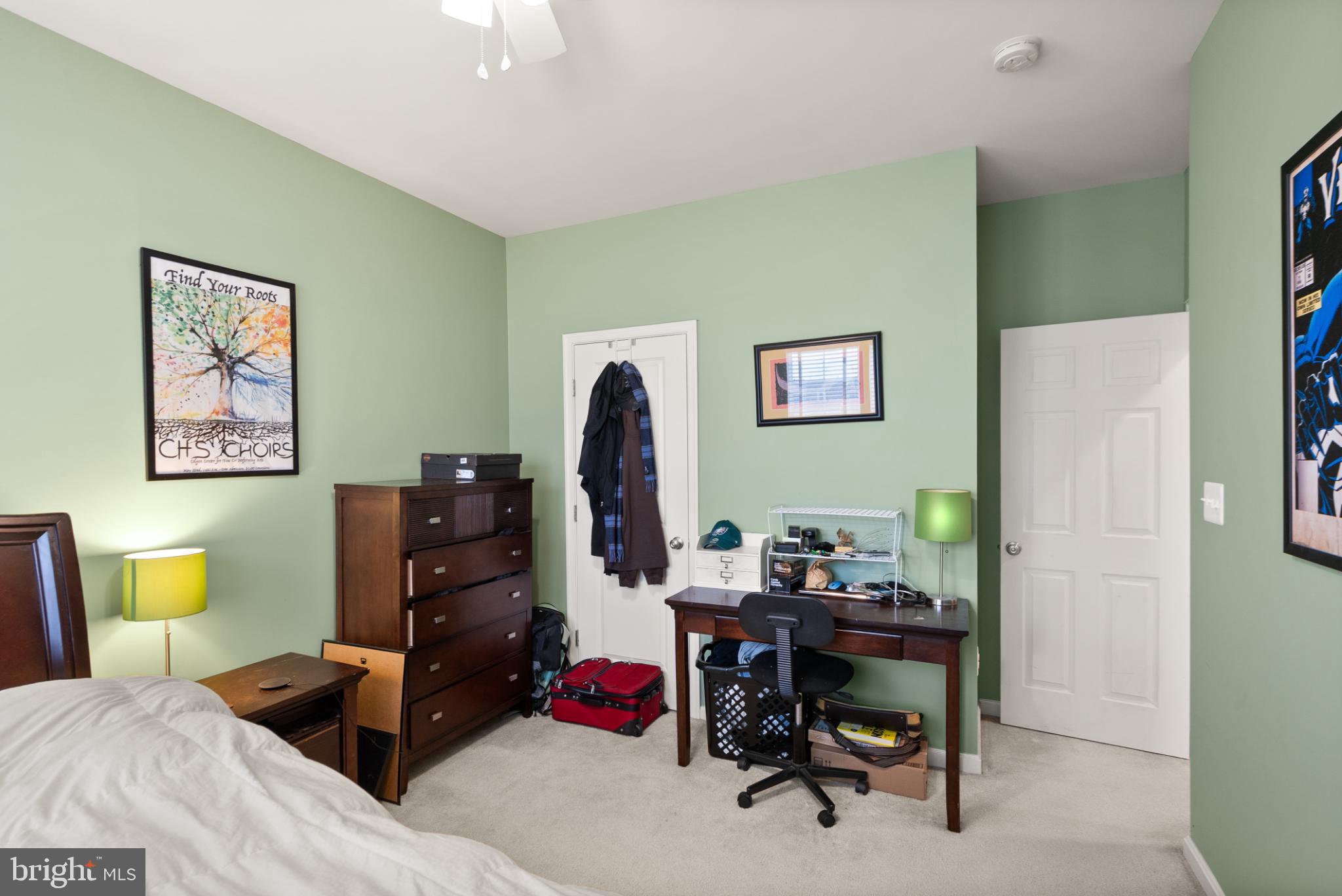 11968 Benton Lake Road Bristow, VA 20136 - Photo 26 of 52 Cozy green-hued bedroom with workspace.