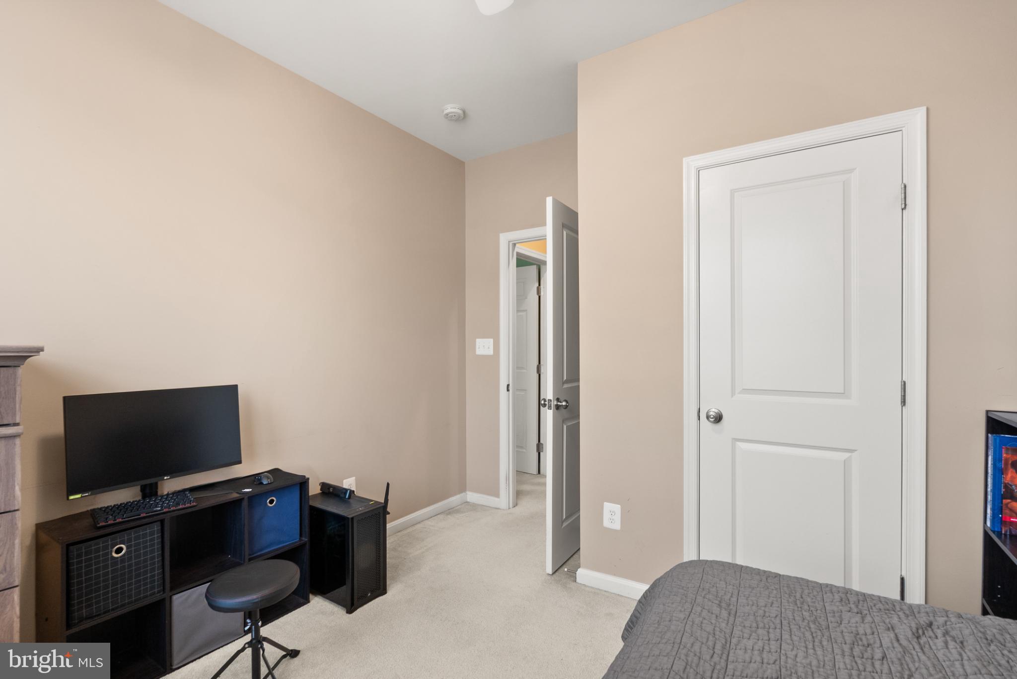 11968 Benton Lake Road Bristow, VA 20136 - Photo 28 of 52 3rd bedroom has lighted ceiling fan & big closet.
