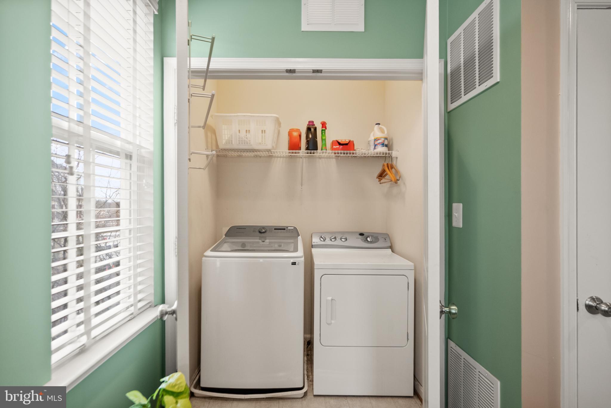 11968 Benton Lake Road Bristow, VA 20136 - Photo 30 of 52 Bright laundry nook with 2022 Washing Machine.