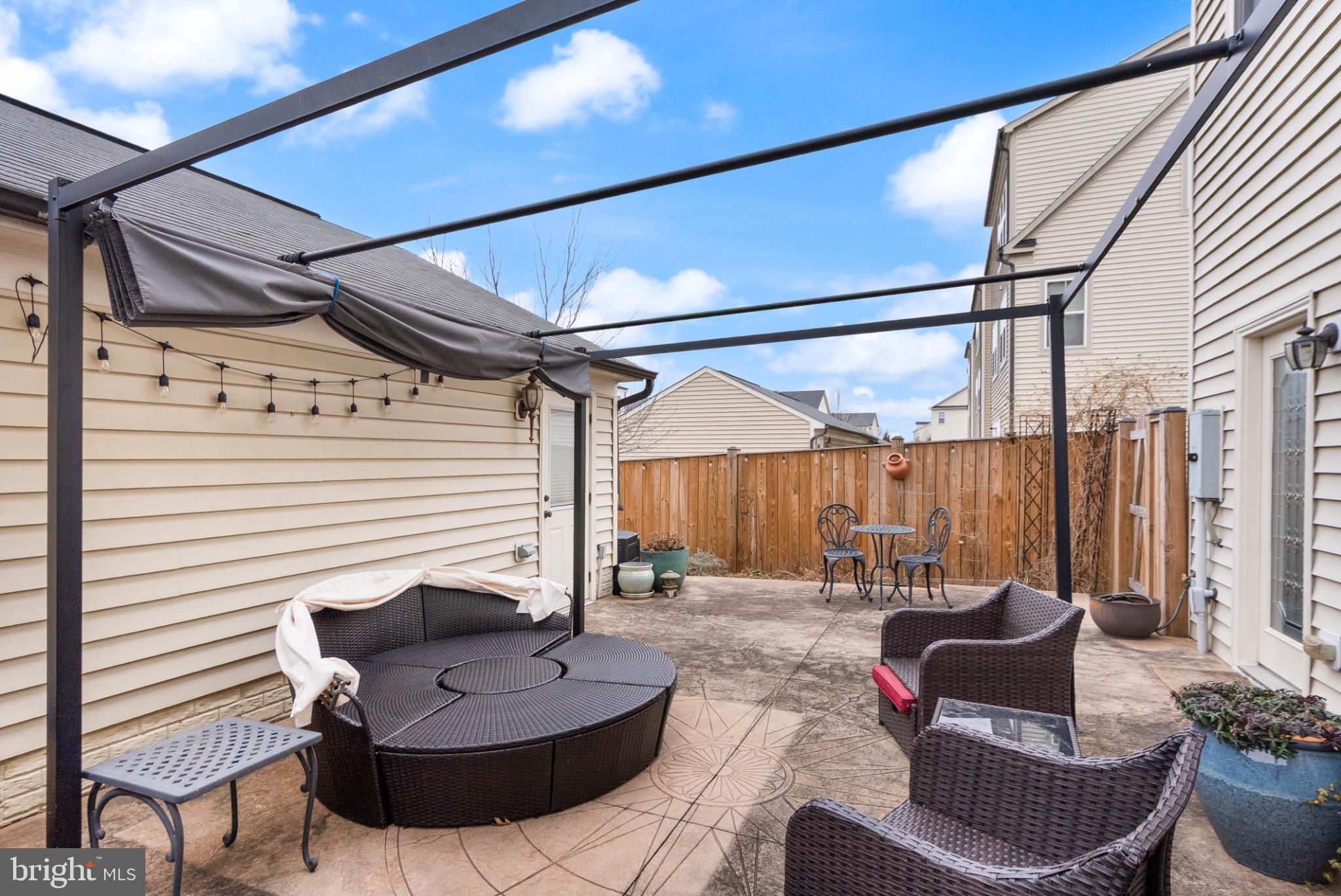 11968 Benton Lake Road Bristow, VA 20136 - Photo 43 of 52 Pergola w/retractable fabric roof conveys w/house.