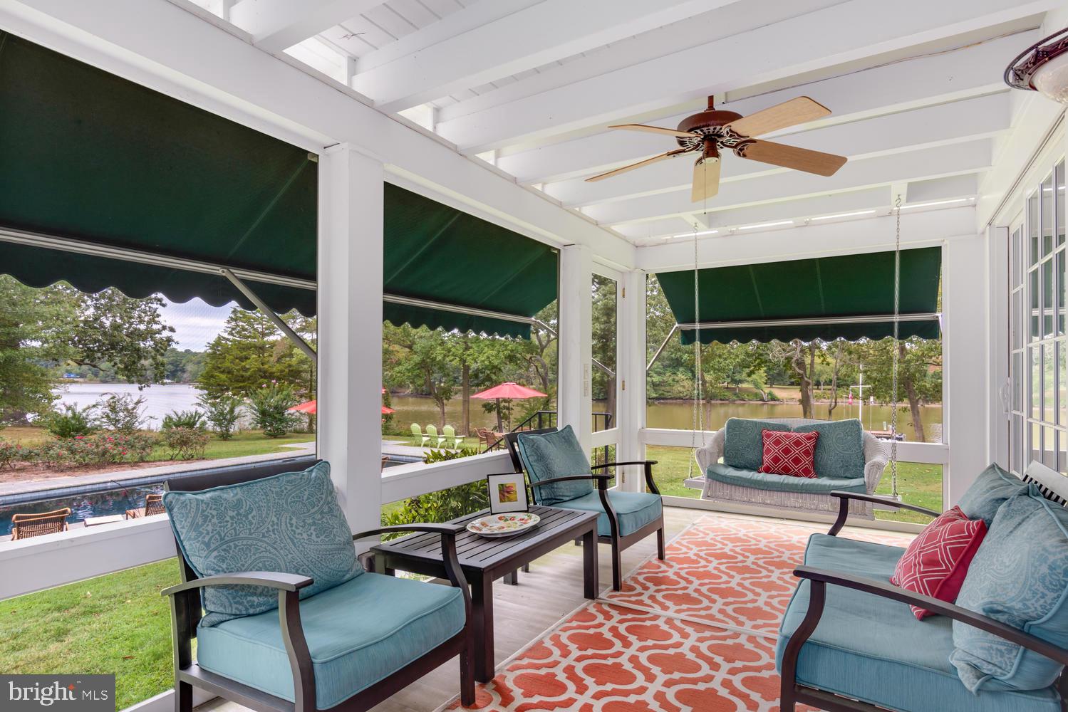 28692 Edgemere Road Easton, MD 21601 - Photo 36 of 80 Main screen porch with awnings