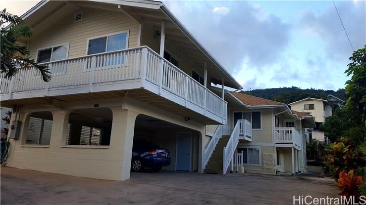 2714 East Manoa Road Honolulu, HI 96822 - Photo 1 of 1 a front view of a house with a garage