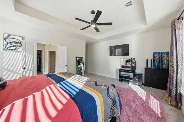 a bathroom with a sink double vanity and a mirror