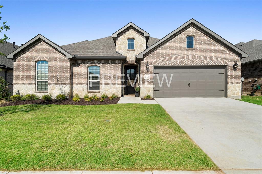 915 Uplands Drive Northlake, TX 76226 - Photo 1 of 1 a front view of a house with a yard and garage