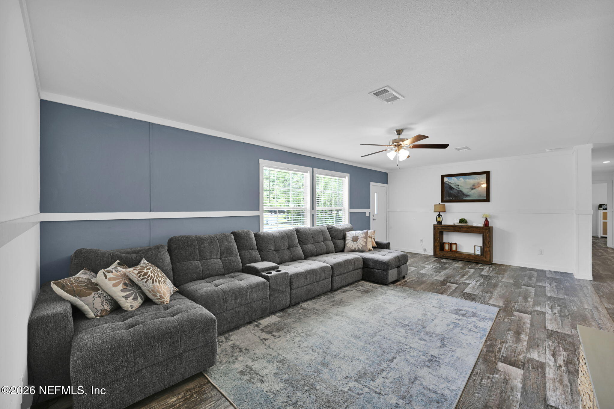540783 Lem Turner Road Callahan, FL 32011 - Photo 10 of 36 a living room with furniture and wooden floor