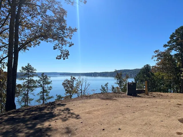 a view of a road with a building in the background