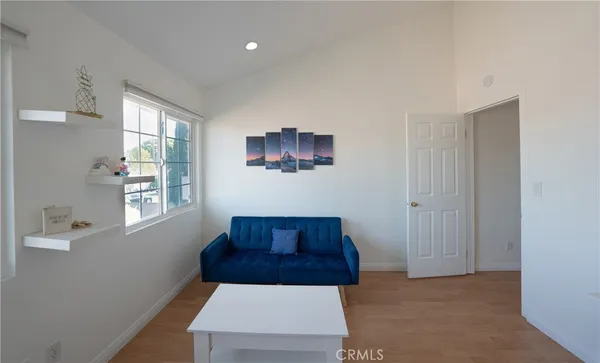 a view of a hallway with windows
