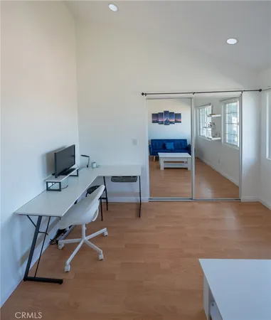 a workspace with furniture and window