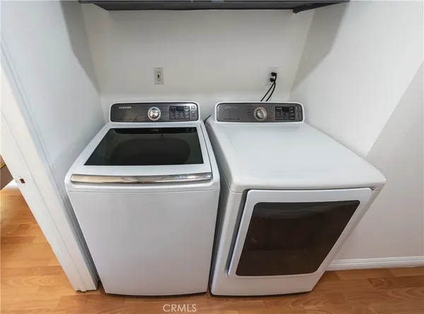 a view of a kitchen with a sink