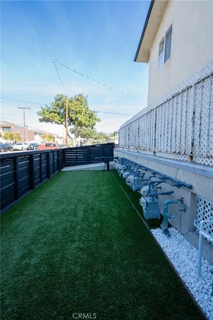 a view of yard with outdoor seating