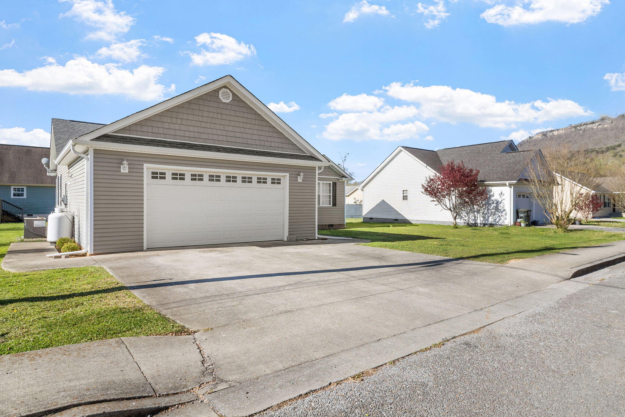 411 West 2nd Street Jasper, TN 37347 - Photo 4 of 42 Sidewalk strolls with a view!