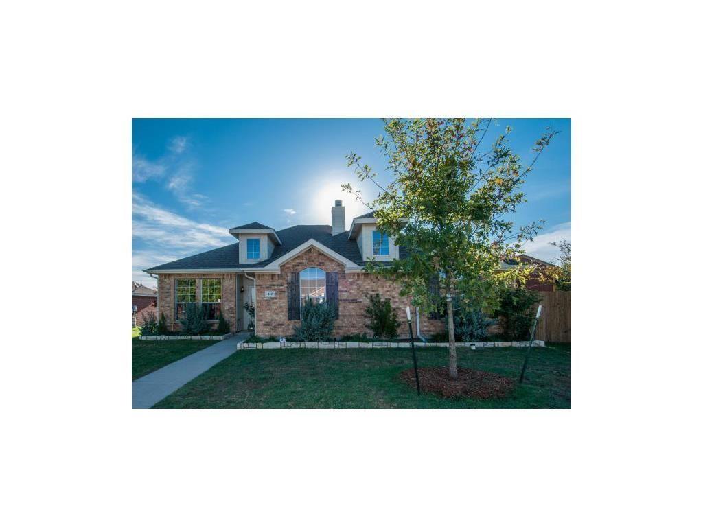 212 Shadow Bend Drive Red Oak, TX 75154 - Photo 1 of 14 View of front of home featuring a front lawn, brick siding, and a chimney