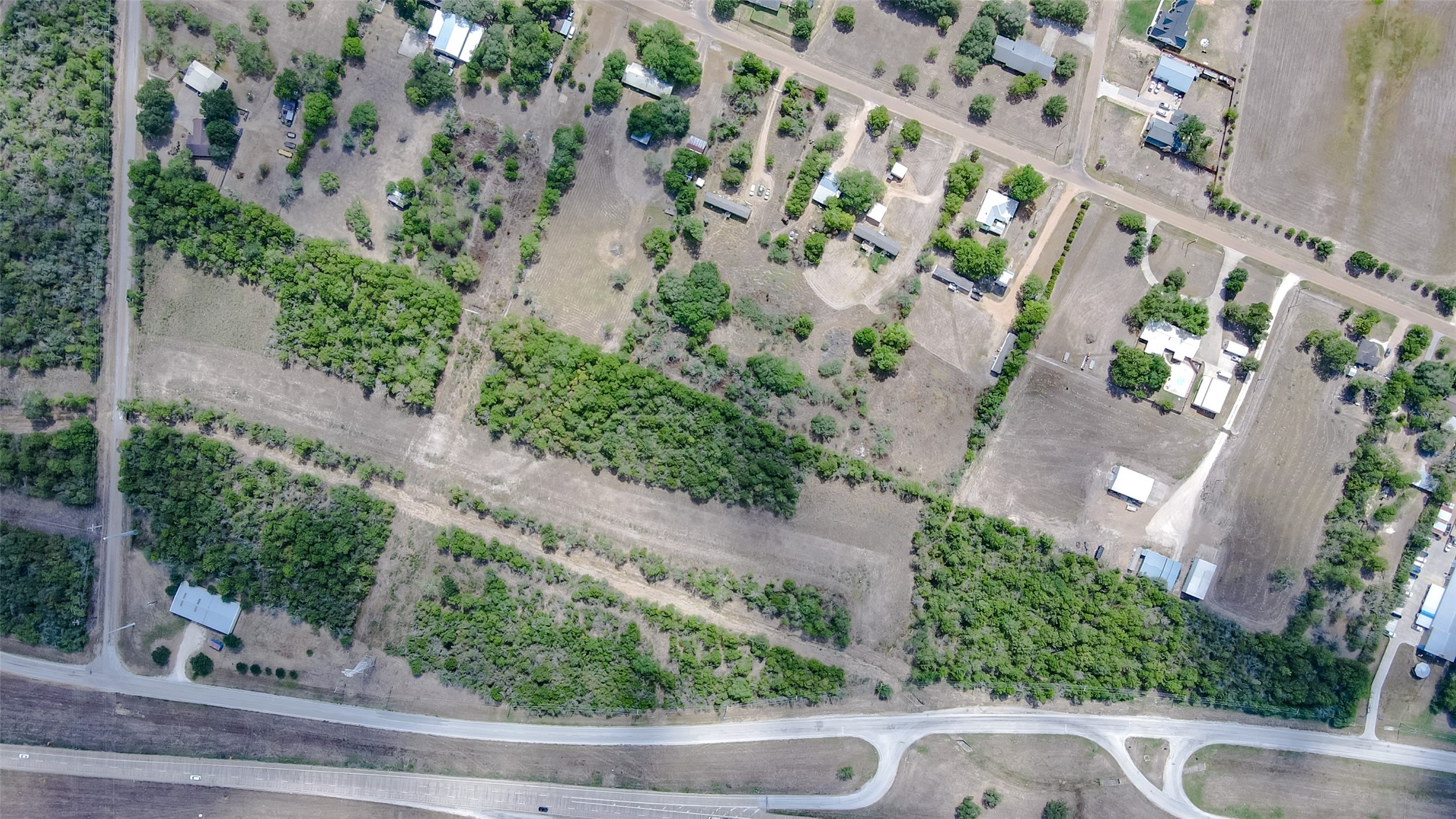 0 State Highway 71 Bypass Columbus, TX 78934 - Photo 3 of 11 an aerial view of a house with a yard