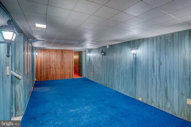 an empty room with closet area