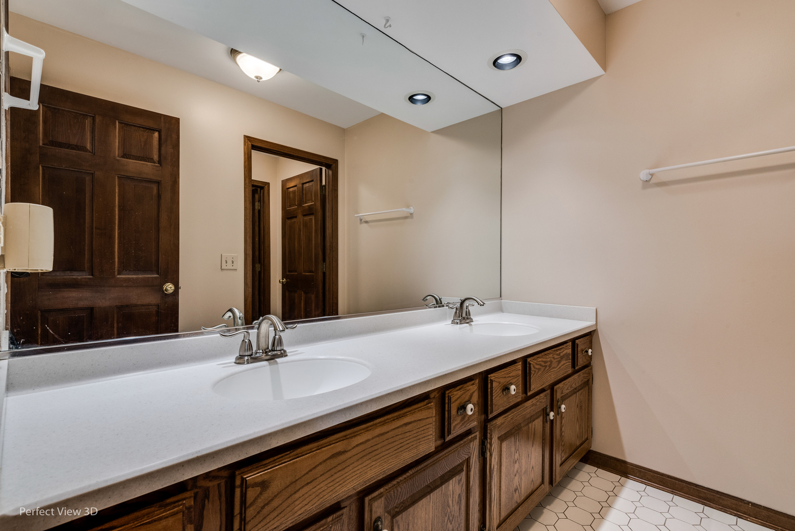 2200 Inverray Road Inverness, IL 60067 - Photo 22 of 52 a bathroom with a sink and a mirror