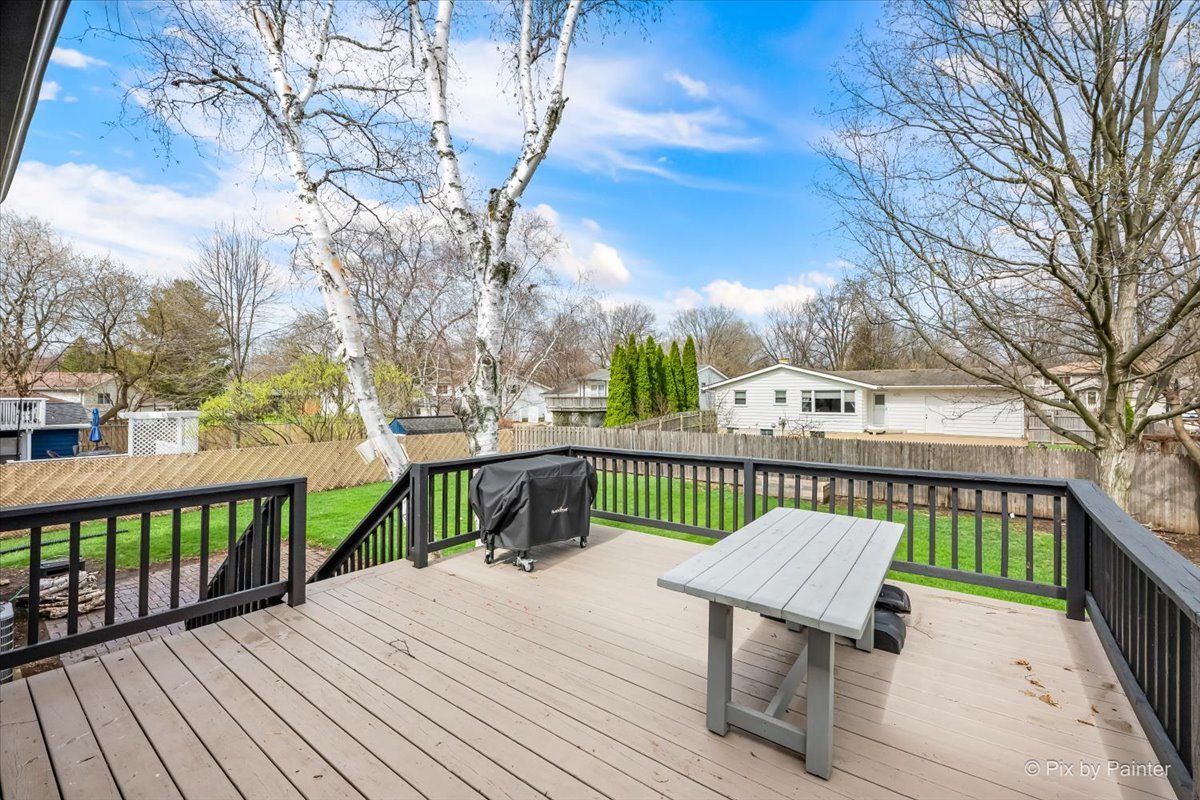 1908 Moore Avenue St. Charles, IL 60174 - Photo 38 of 45 a view of a wooden deck with furniture