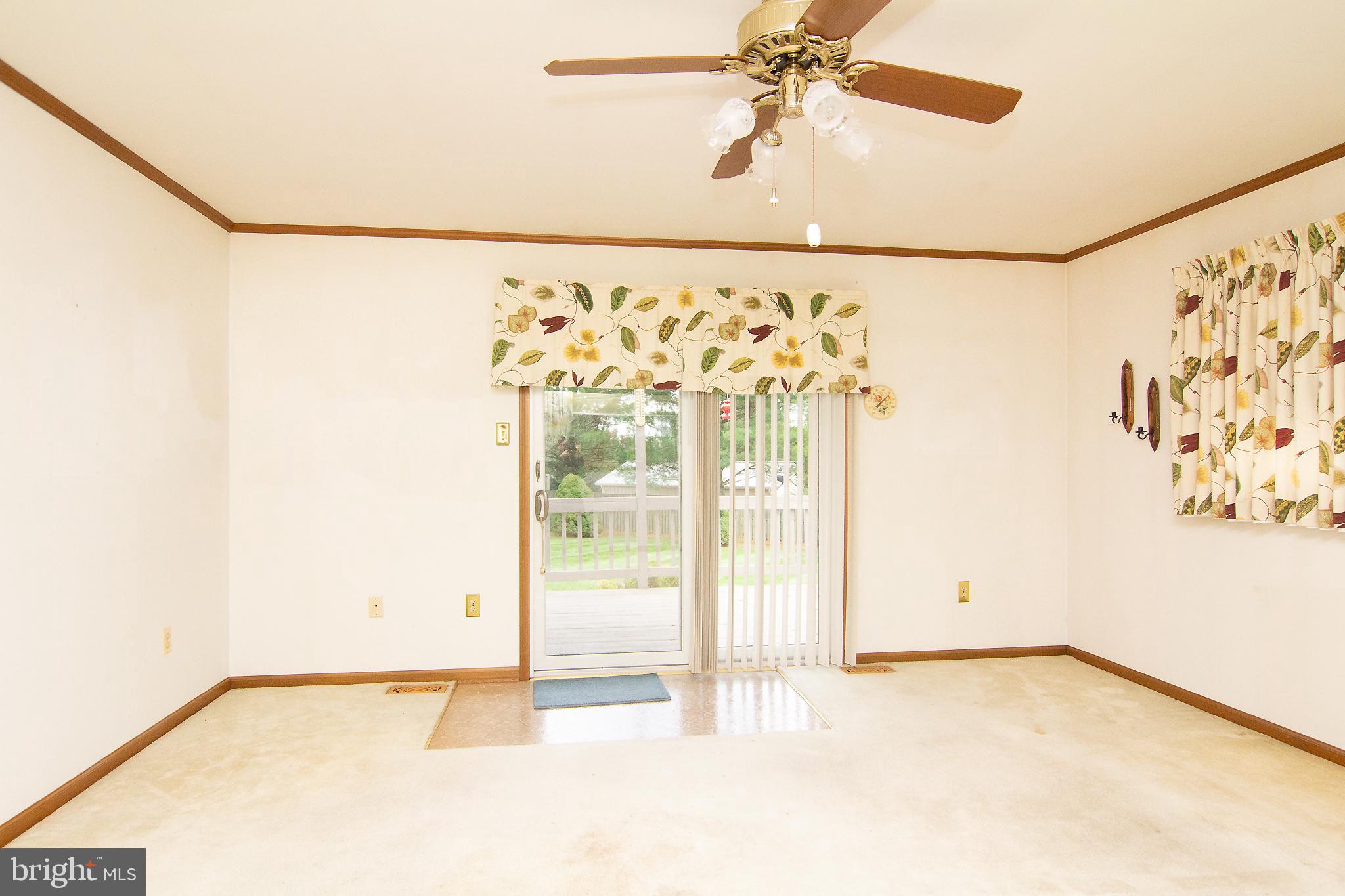 2799 Bert Fowler Road Manchester, MD 21102 - Photo 15 of 33 Family room w/ slider to deck