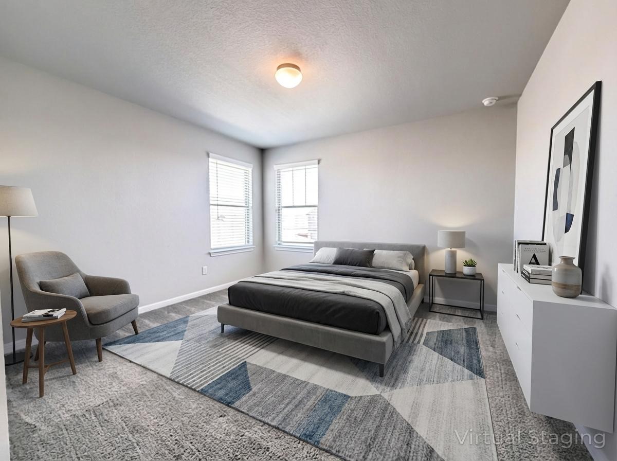 18104 Emu Lane Manor, TX 78653 - Photo 31 of 39 a bedroom with a bed and a couch