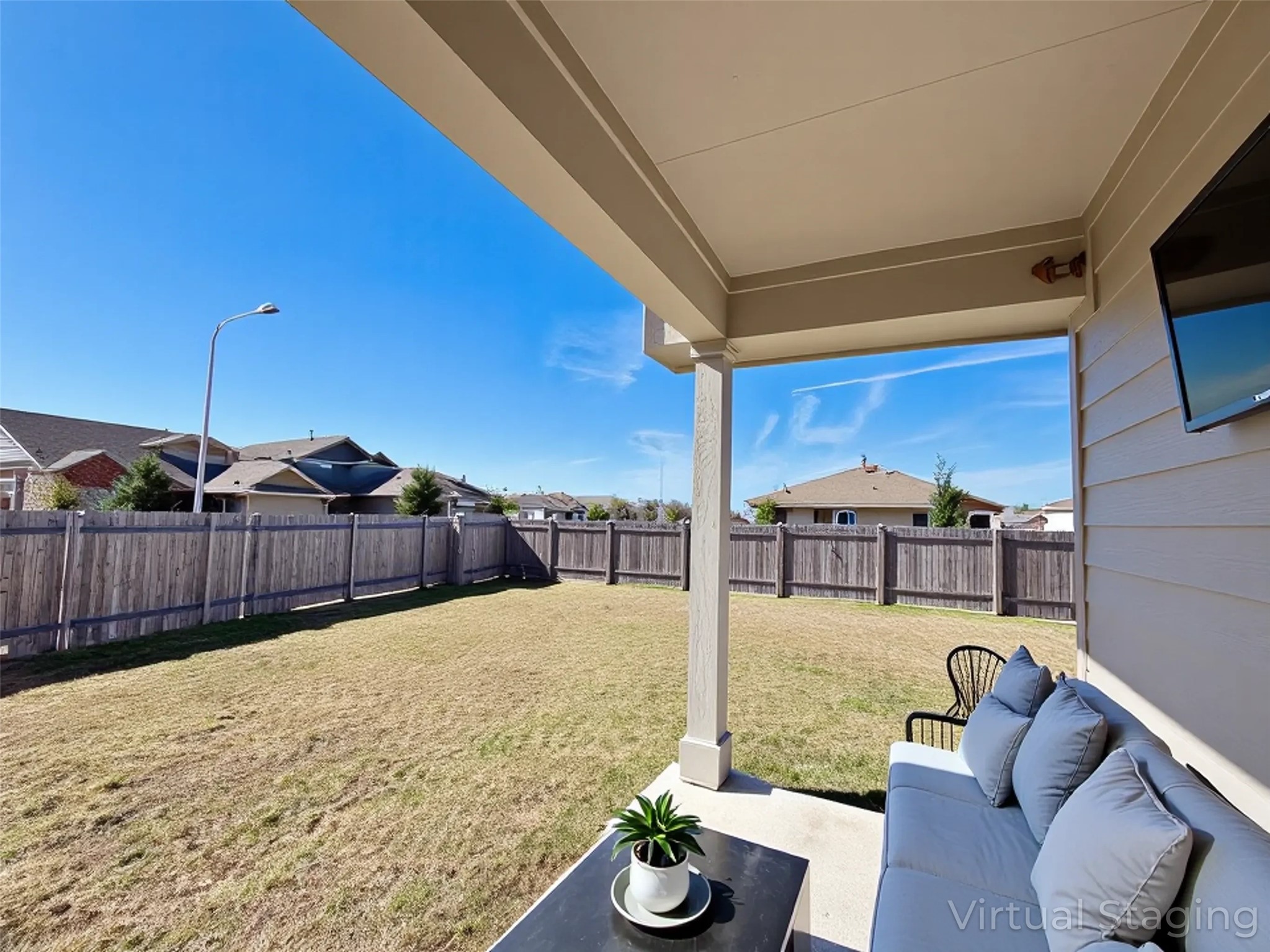 18104 Emu Lane Manor, TX 78653 - Photo 37 of 39 a view of a balcony with chairs and potted plants
