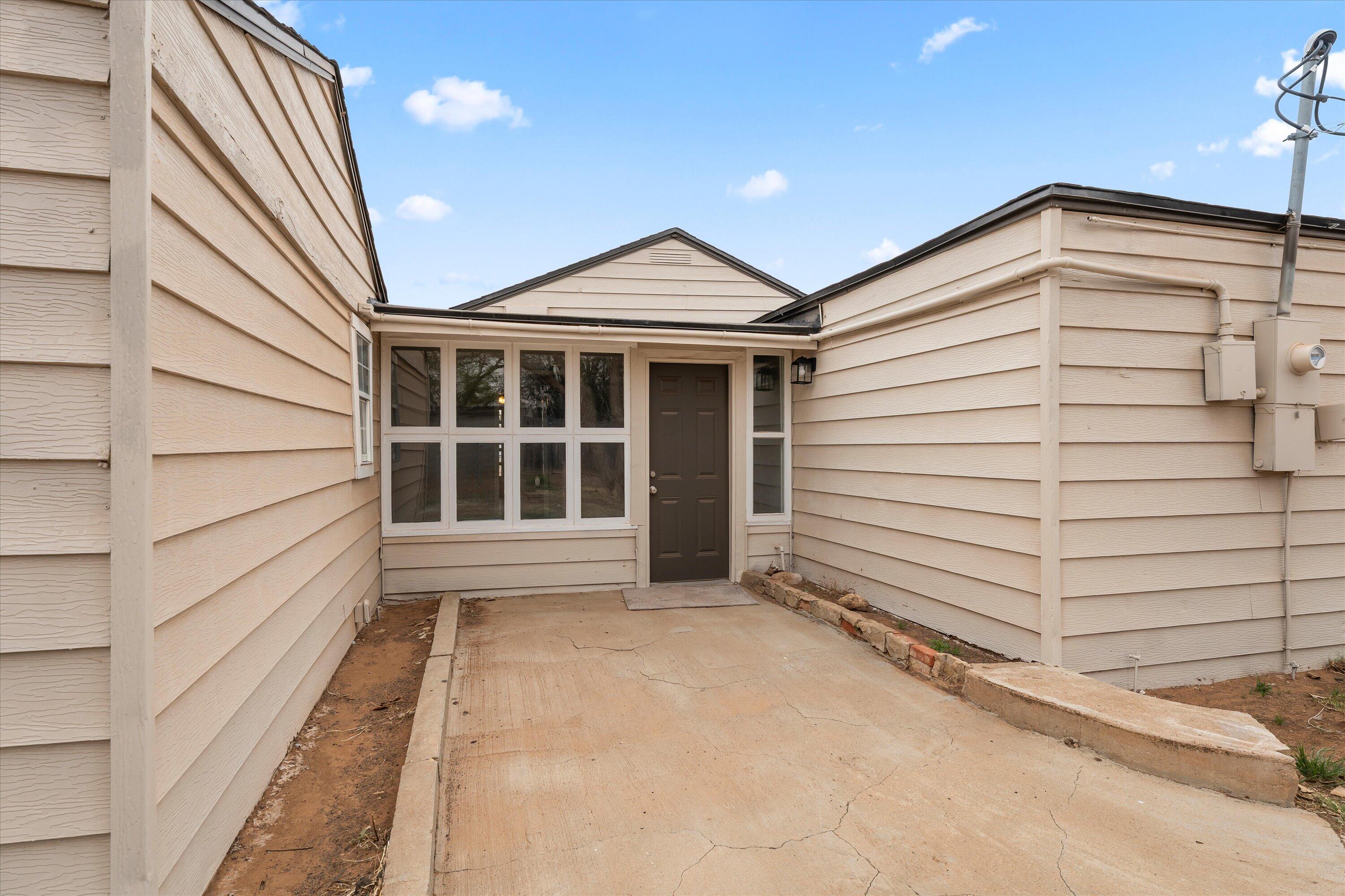 204 Ave L Levelland, TX 79336 - Photo 23 of 27 a view of a house with a window