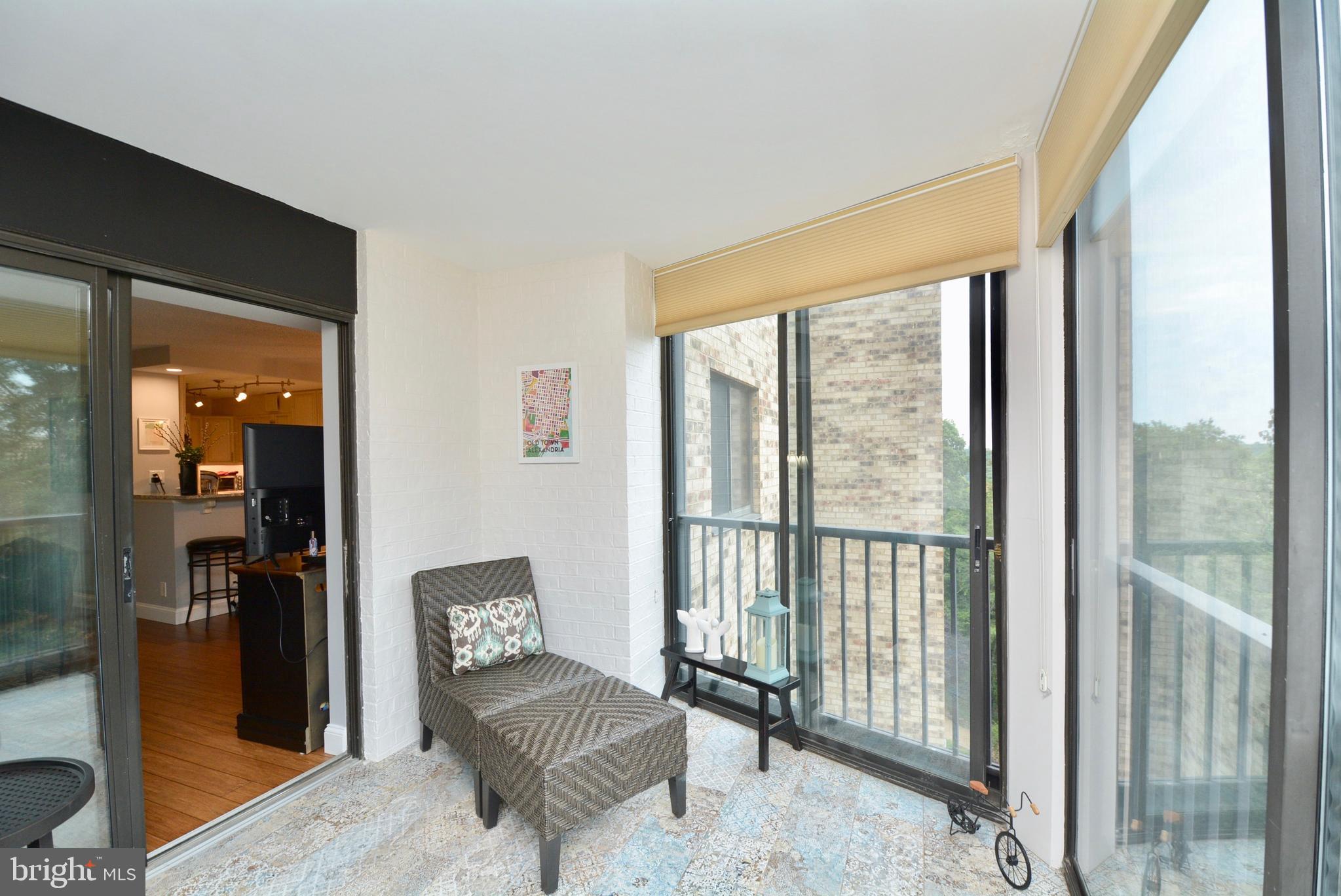 5902 Mt Eagle Drive, Unit 516 Alexandria, VA 22303 - Photo 4 of 55 All sliding doors open for a screened-porch effect