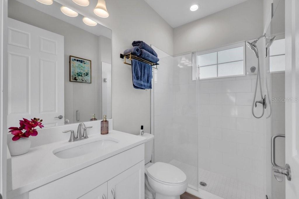 14604 Horse Trot Road Lithia, FL 33547 - Photo 21 of 62 a bathroom with a sink toilet and shower