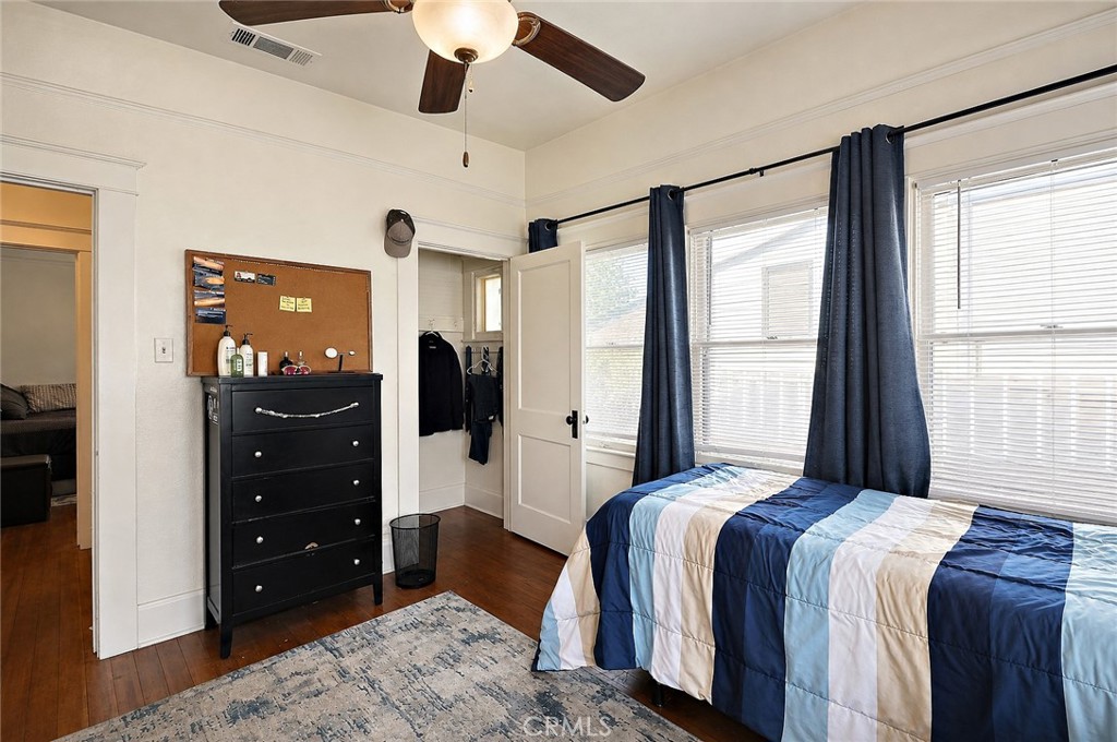 2130 Canal Street Merced, CA 95340 - Photo 20 of 45 a bedroom with a bed closet and flat tv screen