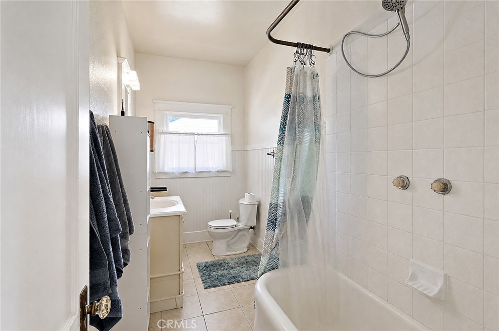 2130 Canal Street Merced, CA 95340 - Photo 22 of 45 a bathroom with a sink a toilet and shower