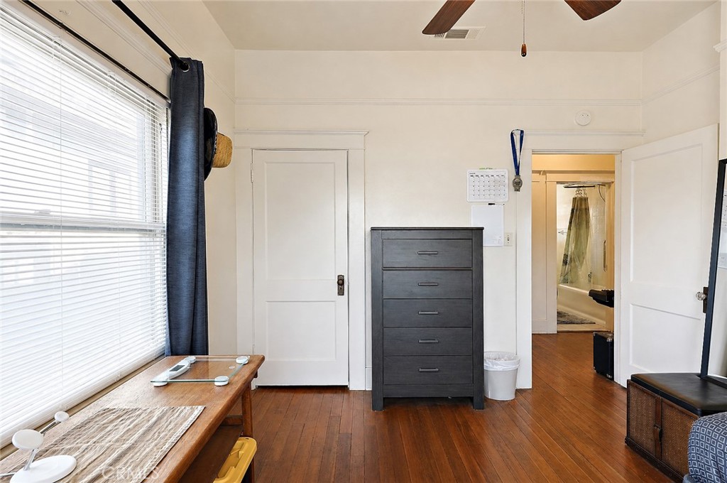 2130 Canal Street Merced, CA 95340 - Photo 28 of 45 an empty room with wooden floor and windows