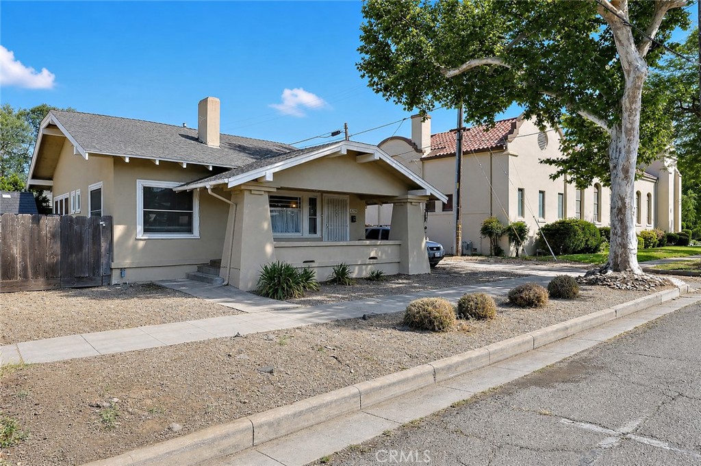 2130 Canal Street Merced, CA 95340 - Photo 4 of 45 a front view of a house with garage and yard