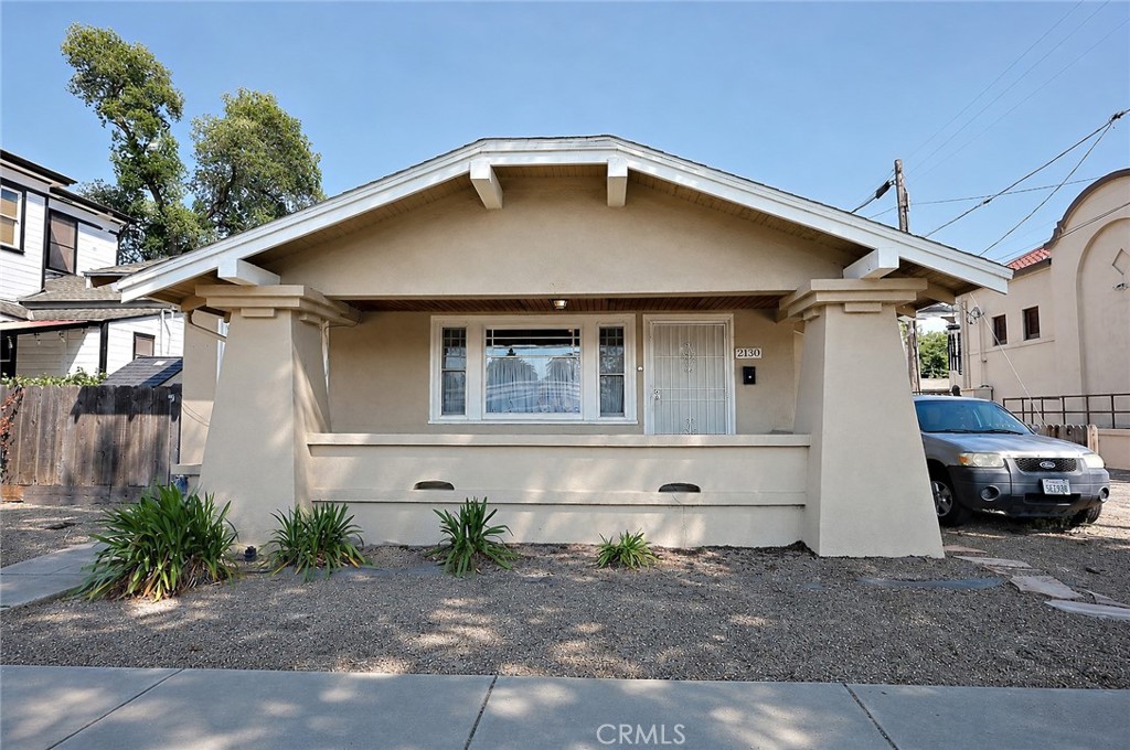 2130 Canal Street Merced, CA 95340 - Photo 5 of 45 a front view of a house with a yard