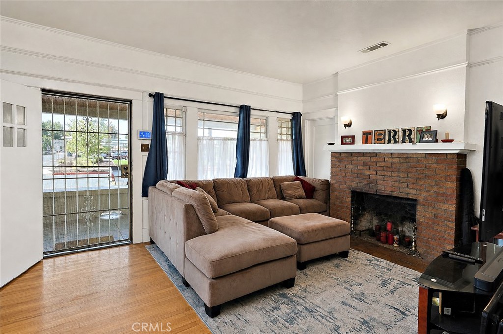2130 Canal Street Merced, CA 95340 - Photo 7 of 45 a living room with furniture and a fireplace