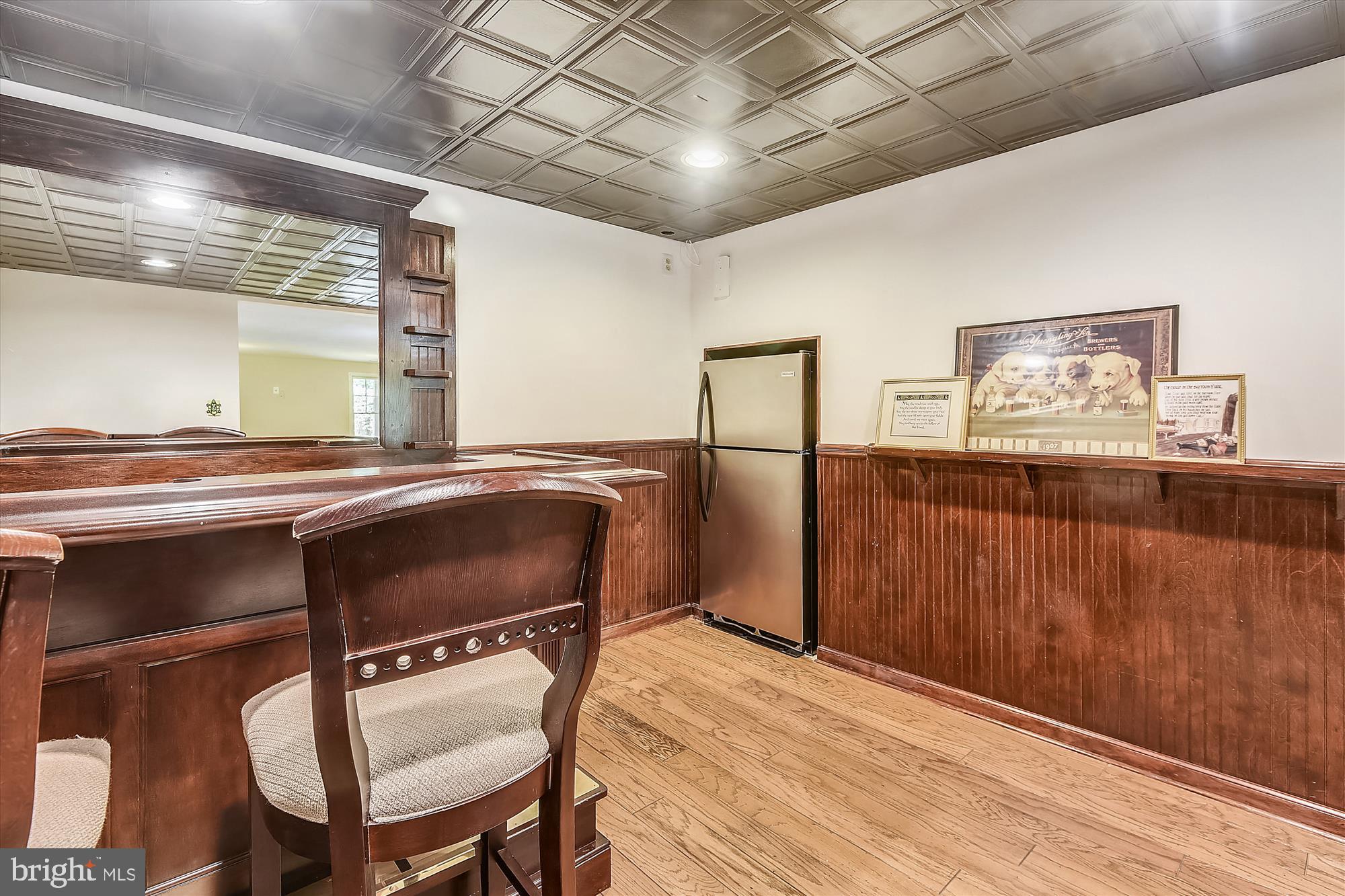 1203 Weatherstone Court Reston, VA 20194 - Photo 39 of 63 Lower level bar has handy drink ledges & fridge