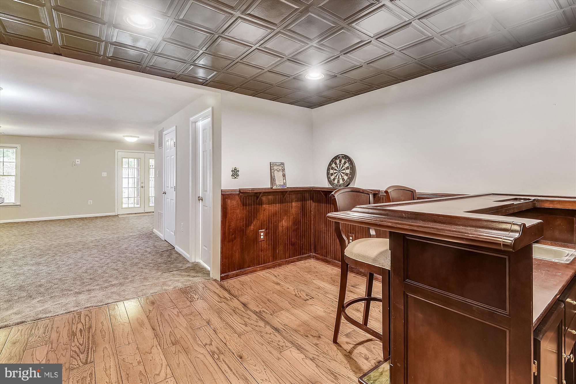 1203 Weatherstone Court Reston, VA 20194 - Photo 40 of 63 Wet bar has custom trim work & recessed lights