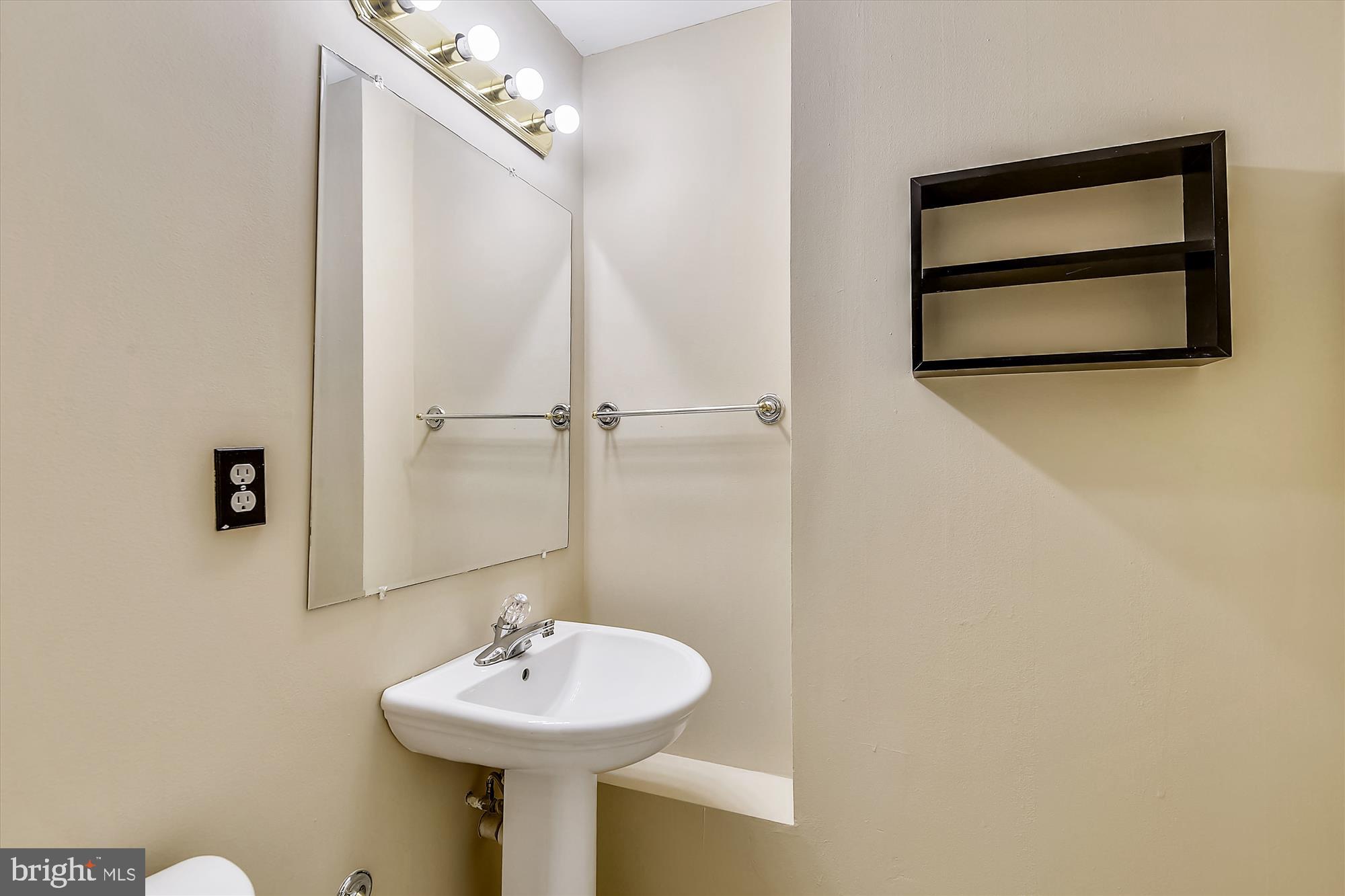1203 Weatherstone Court Reston, VA 20194 - Photo 45 of 63 Lower Level Half bath w/pedastal sink