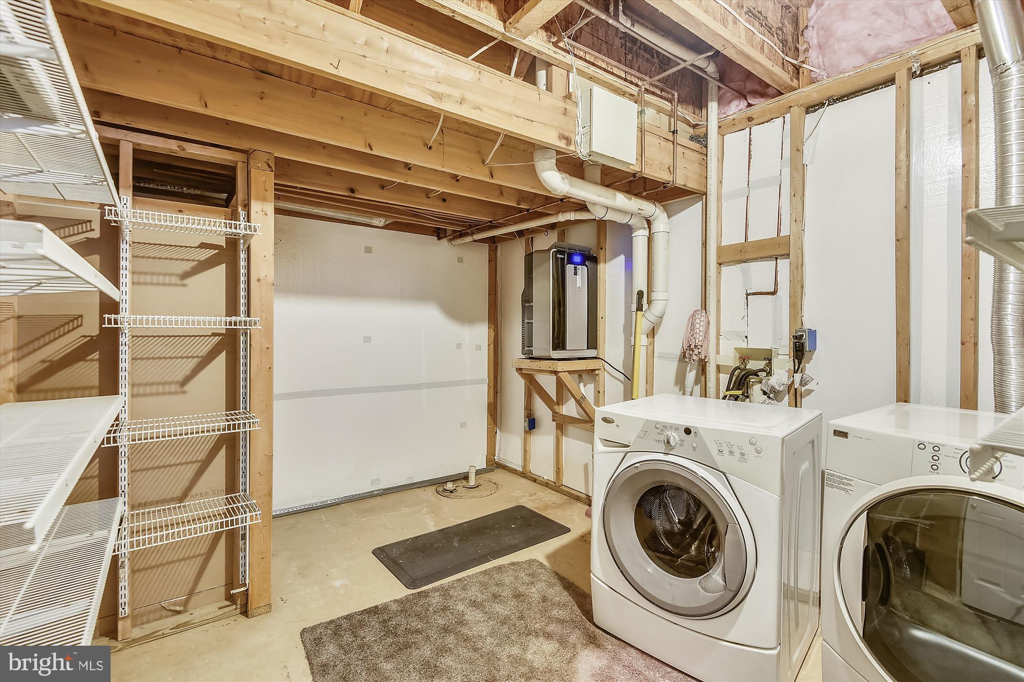 1203 Weatherstone Court Reston, VA 20194 - Photo 46 of 63 Large laundry room with extra shelving