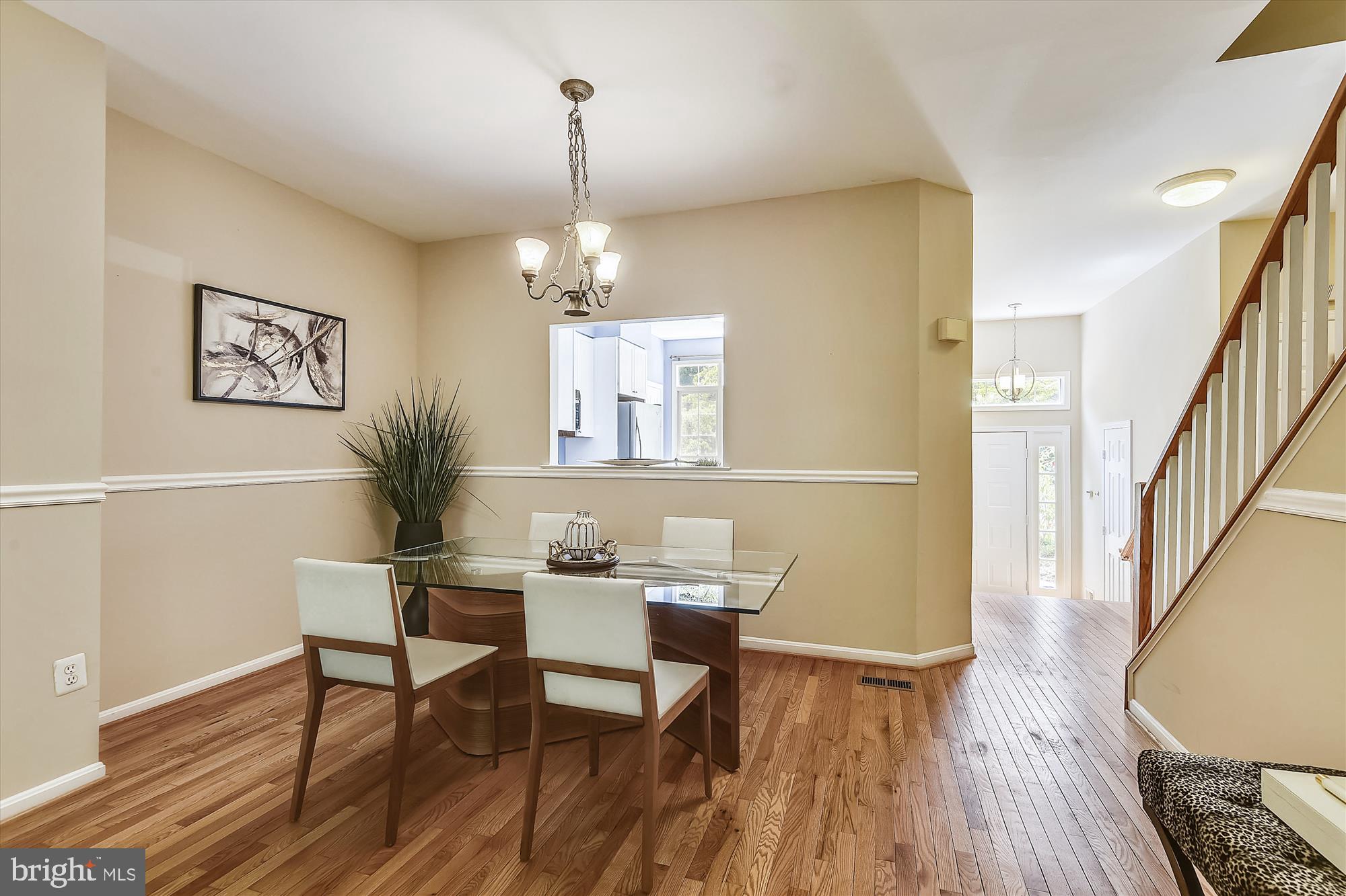1203 Weatherstone Court Reston, VA 20194 - Photo 10 of 63 Dining room w/chair railing & pass through to kit