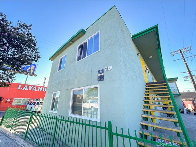 a view of a street from a balcony