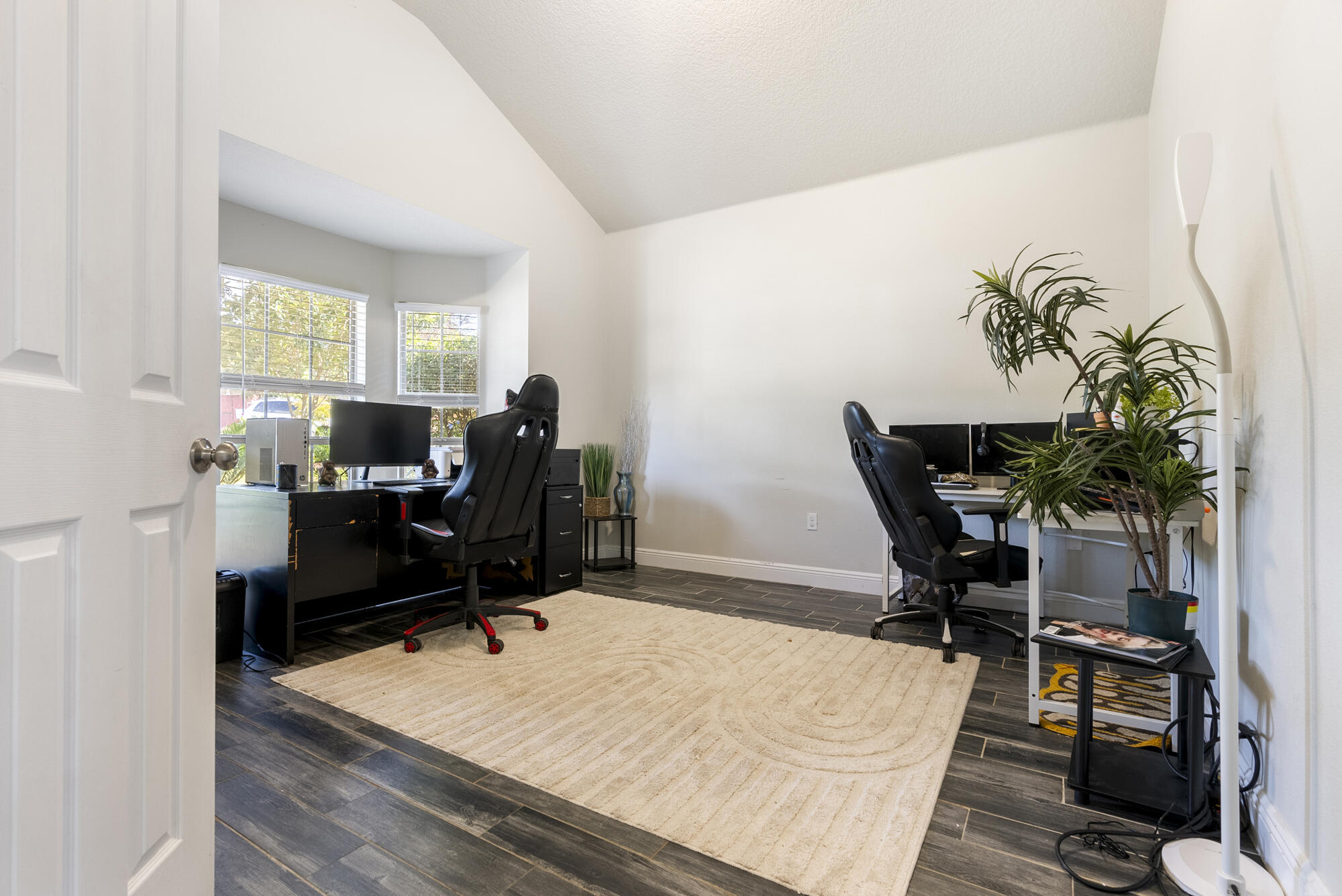 517 Pheasant Trail Crestview, FL 32536 - Photo 31 of 64 a view of a workspace with furniture and a window