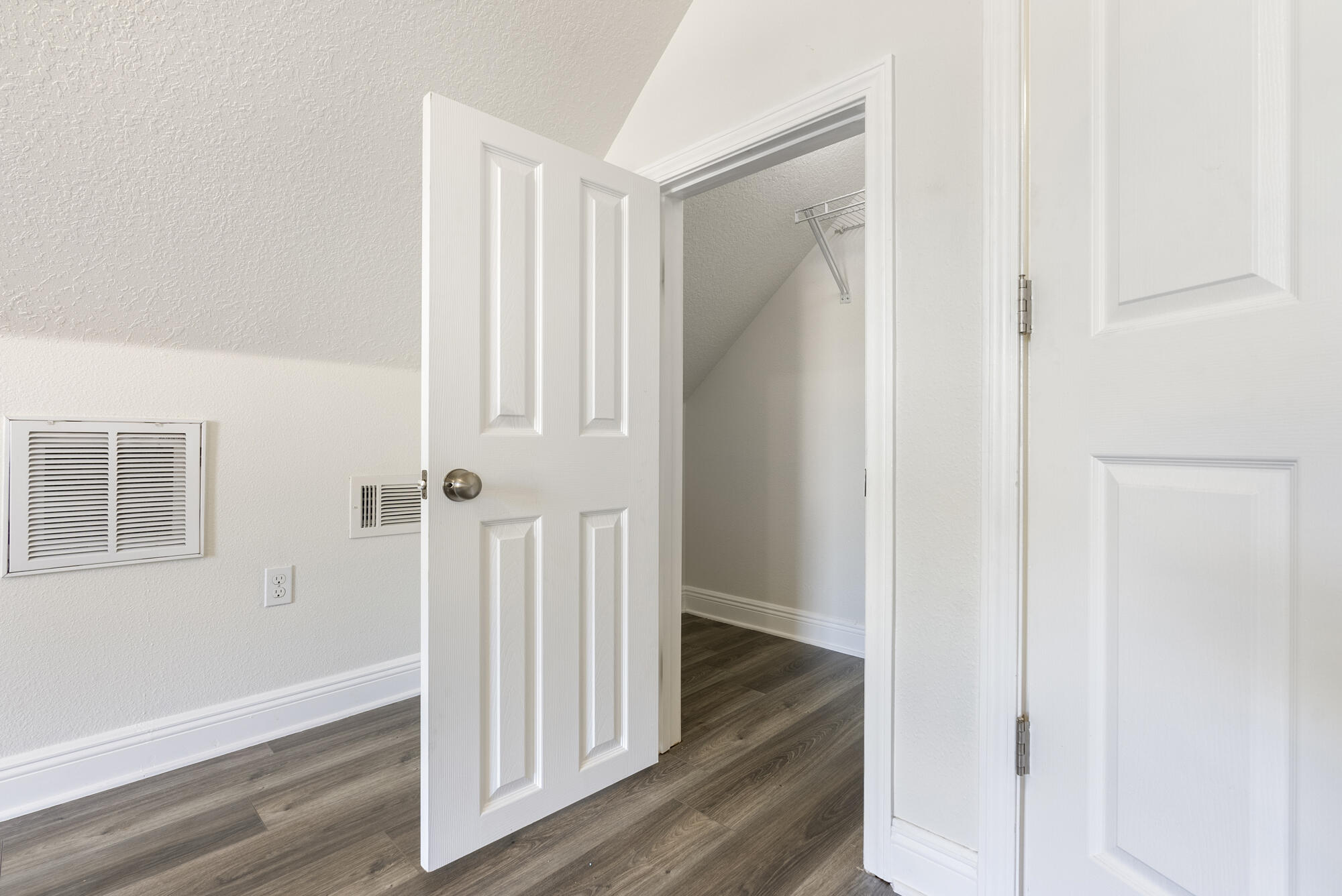 517 Pheasant Trail Crestview, FL 32536 - Photo 35 of 64 a view of a hallway with wooden floor and entryway