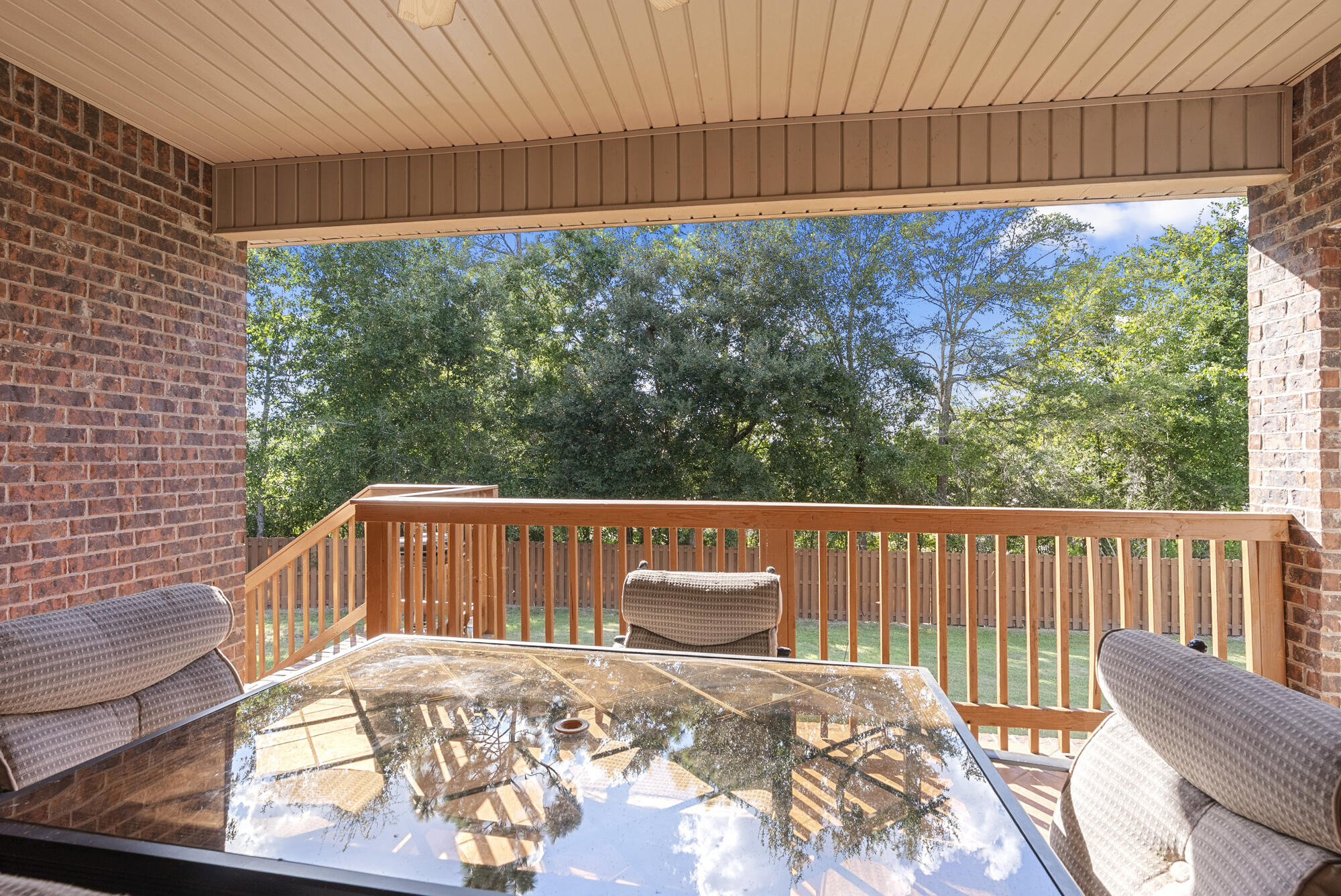 517 Pheasant Trail Crestview, FL 32536 - Photo 42 of 64 a view of a two chairs in the deck