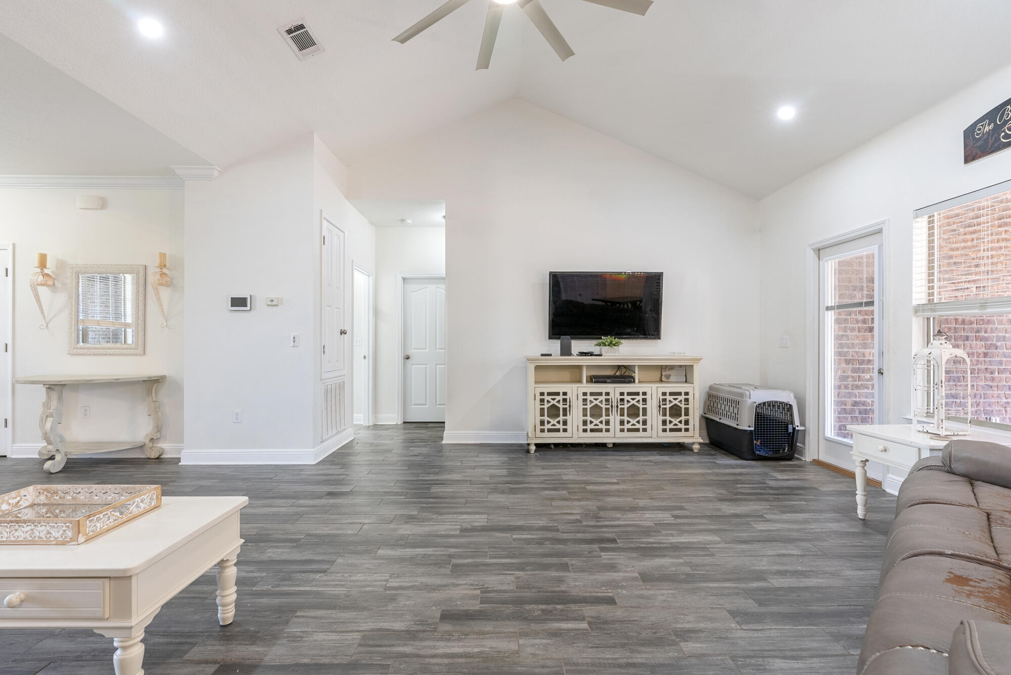 517 Pheasant Trail Crestview, FL 32536 - Photo 9 of 64 a view of a livingroom with furniture and a flat screen tv