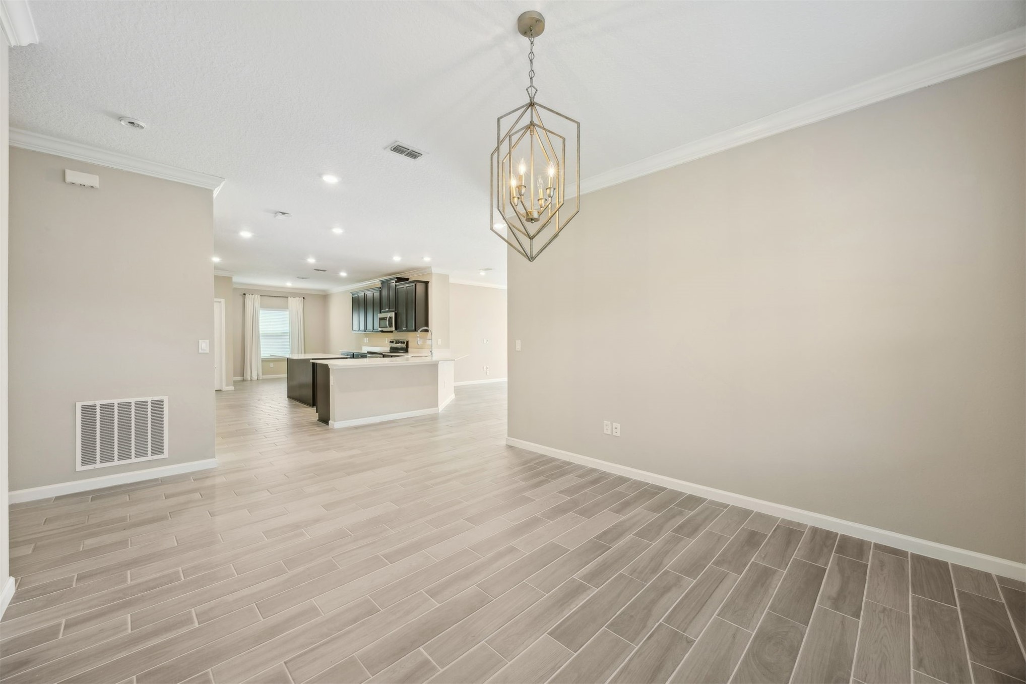 85237 Fall River Parkway Fernandina Beach, FL 32034 - Photo 14 of 88 a view of kitchen with furniture and wooden floor