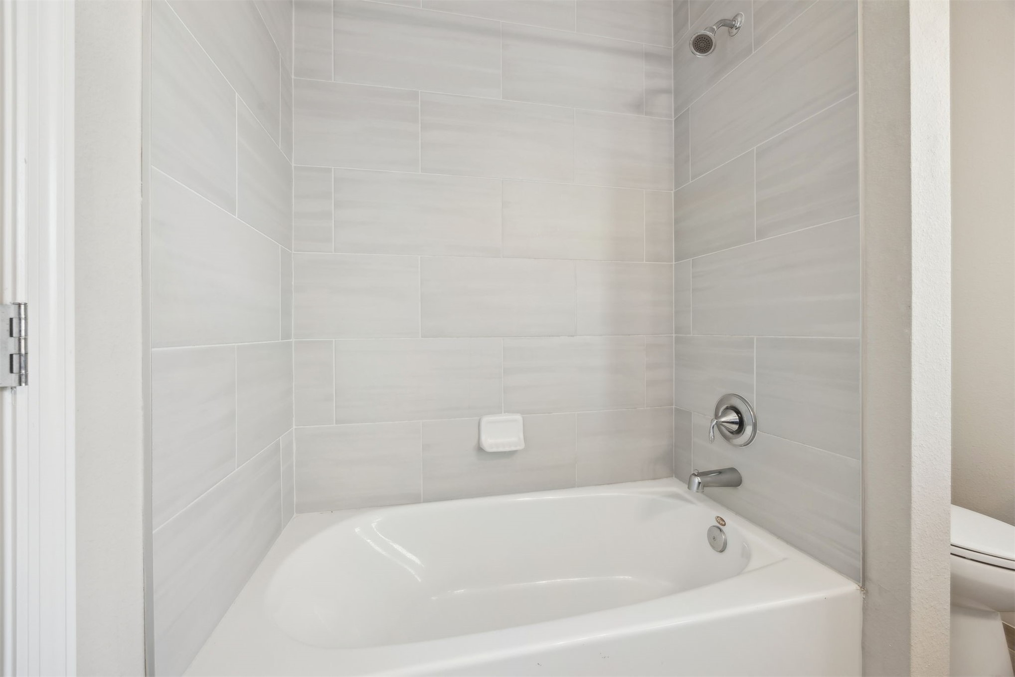 85237 Fall River Parkway Fernandina Beach, FL 32034 - Photo 36 of 88 a white bath tub sitting next to a white wooden wall