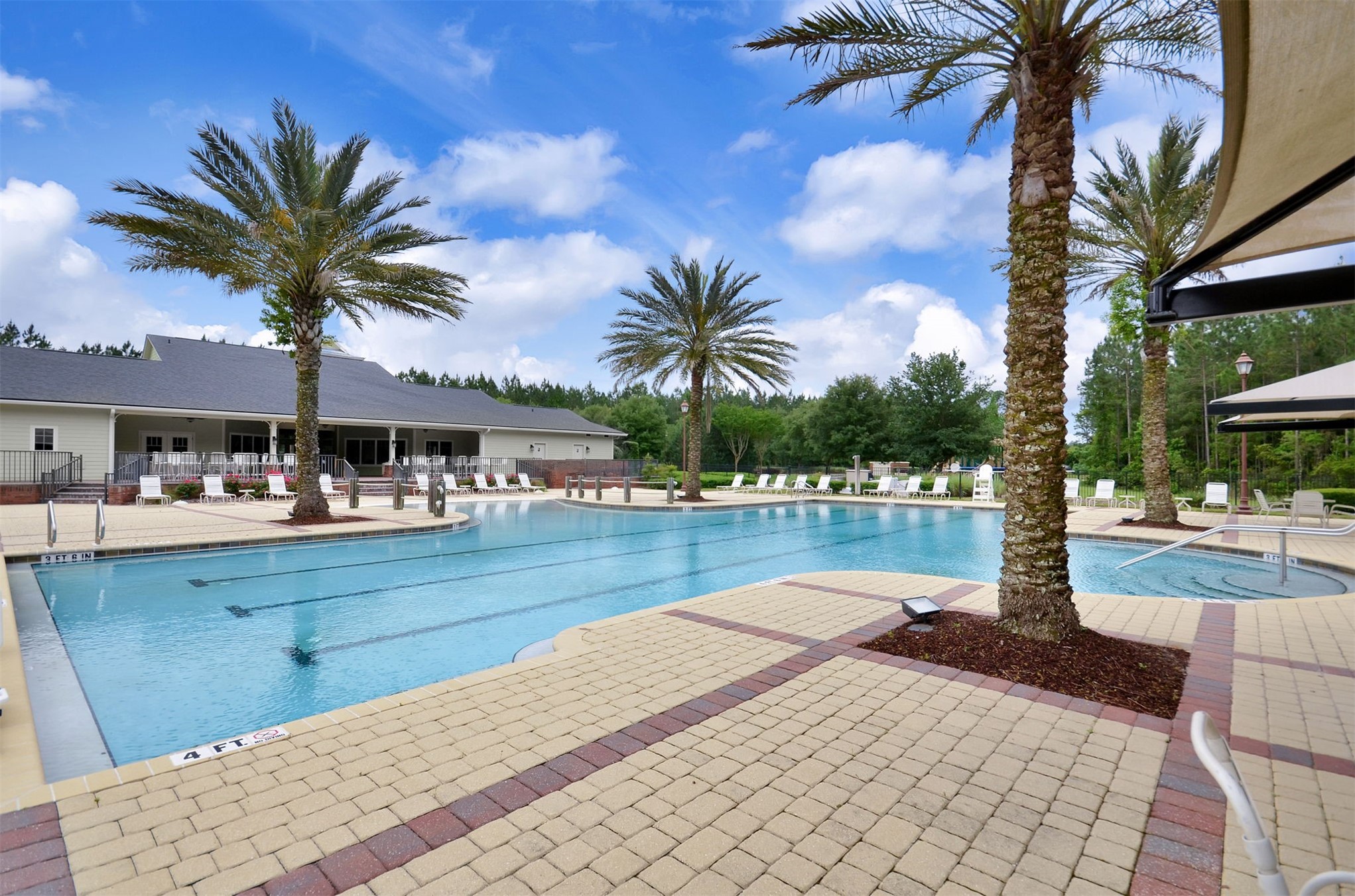 85237 Fall River Parkway Fernandina Beach, FL 32034 - Photo 70 of 88 a view of swimming pool with table and chairs