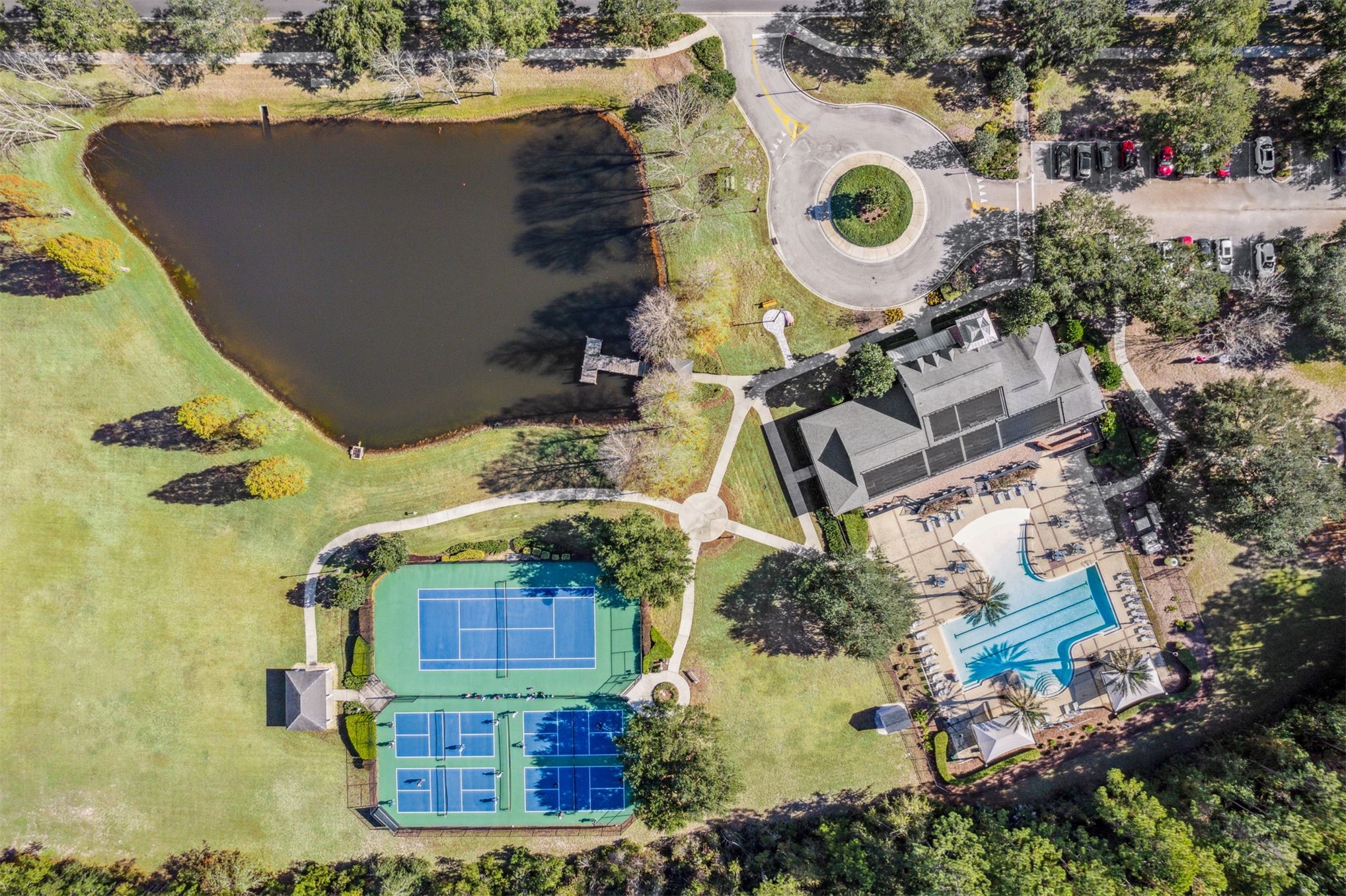 85237 Fall River Parkway Fernandina Beach, FL 32034 - Photo 88 of 88 an aerial view of a house with a yard and a large tree