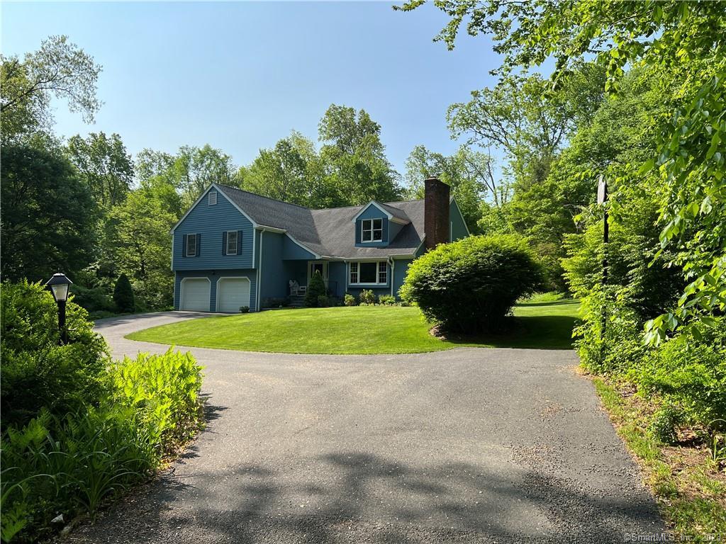 1461 Bucks Hill Road Southbury, CT 06488 - Photo 1 of 1 a view of a house with a yard and potted plants
