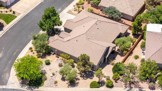 1609 East 10 S Street St. George, UT 84790 - Photo 60 of 68 Single-story residence featuring a tile roof and a desert-landscaped front yard with mature trees